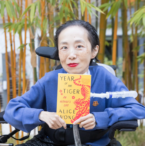Alice Wong with her book Year of the Tiger: An Activist's Life